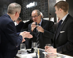 Cellini President Leon Adams inspects an A. Lange & Söhne model along with Matthew Sullivan and Paul Wittekind