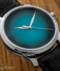 Endeavour Center Seconds Concept Blue Lagoon with wood grain background