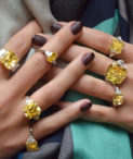 Intense Yellow Radiant Cut Diamond Rings on two hands