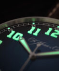 Heritage Center Seconds Funky Blue luminous dial close up