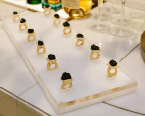 Caviar rings: American caviar â€˜gemsâ€™ on edible cracker rings w/ crÃ¨me fraiche, by Peter Callahan Catering