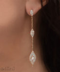 donna rose cut drop earrings rose gold on woman's ear