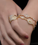 Donna Rose Cut Marquis Bolo Bracelets and Signet Rings on woman's hands