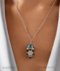 Fabergé heritage white gold diamond teal guilloche enamel snowflake surprise locket