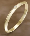 Nefertiti NB313 Yellow Gold Awaken Single Diamond Lozenge Bangle by Nadine Berbay
