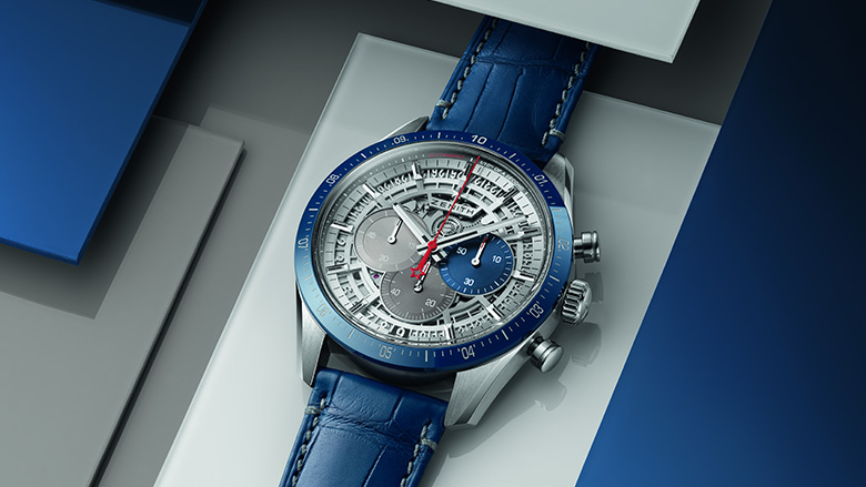Zenith Chronomaster 2 laid on gray and blue color tiles